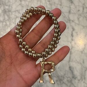 New NWOT Anthropologie Gold Beaded Bracelet bamboo R Charm OS
